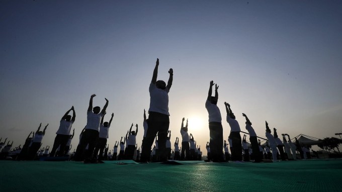 હજારો અમદાવાદીઓએ વિશ્વ યોગ દિવસની ઉજવણીમાં ઉત્સાહ ભેર ભાગ લીધો (Express photo by Nirmal Harindran)