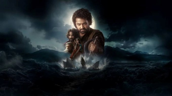 <strong>Devara: Part 1</strong><br>તેલુગૂ એક્શન અને ડ્રામા ફિલ્મ દેવારા: પાર્ટ 1 એ બોકસ ઓફિસ પર ઠીકઠાક કલેક્શન કર્યું હતું. ઓટીટી પર પણ તેનો સારો એવો દબદબો છે. આ ફિલ્મ સૌથી વધુ જોવામાં આવેલી 10 ફિલ્મોમાં આંઠમા સ્થાન પર છે. આ ફિલ્મમાં જૂનિયર એનટીઆર, સૈફ અલી ખાન, જ્હાનવી કપૂર અને પ્રકાશ રાજ જેવા કલાકારો છે. (Photo: Netflix)