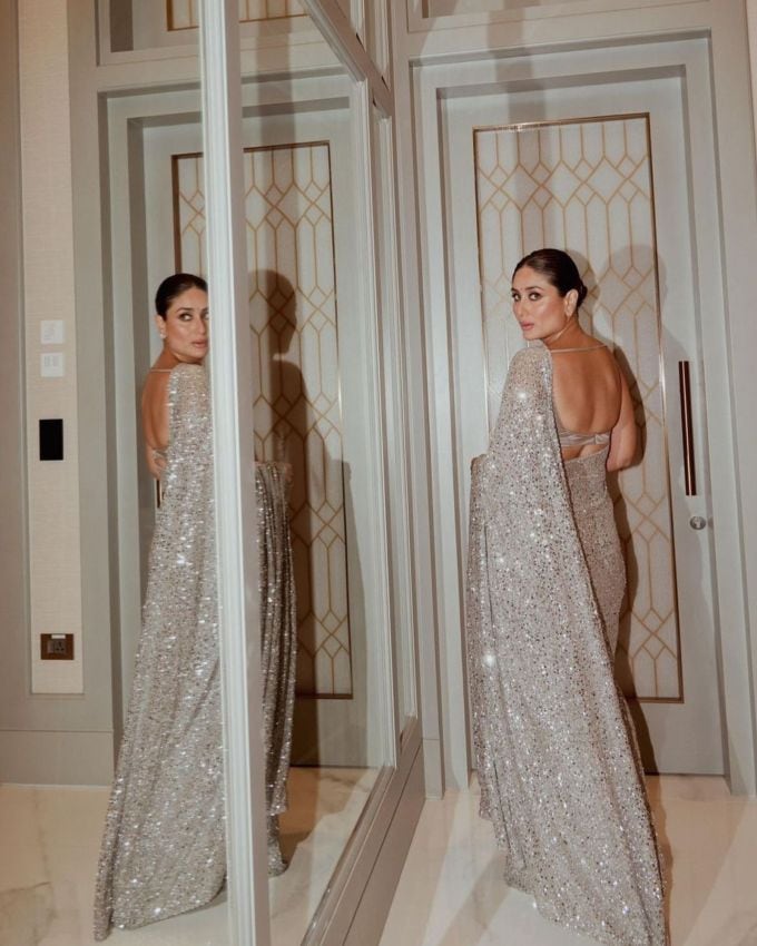 <strong>કરીના કપૂર : </strong>કરીના કપૂરએ ઓફ વાઈટ શિમર સિલ્વર  ગ્લીટરિંગ સાડી પસંદ કરી છે, જેમાં વધારે સાઈની ટીકી વર્ક જોવા મળે છે, તેણે સાડી પર કોન્ટ્રાસ્ટમાં ગોલ્ડન સ્લીવલેસ વી નેકલાઇન વાળો બ્લાઉઝ પસંદ કર્યો છે, જેમાં ખાસ બેકલેસ બ્લાઉઝની ડિઝાઇન છે જે તેના લુકને ગ્લેમરસ ટચ આપે છે.