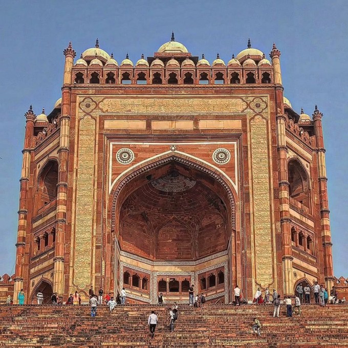 <strong>Buland Darwaza : બુલંદ દરવાજા</strong><br>આગ્રાનો બુલંદ દરવાજા પ્રખ્યાત ઐતિહાસિક ઇમારત છે. બાદશાહ અકબરે ગુજરાત પર જીતની યાદમાં વર્ષ 1602માં બુલંદ દરવાજાનું નિર્માણ કરાવ્યું હતું. આ દરવાજાની પૂર્વમાં ફારસીમાં શિલાલેખ છે. બલુઆ પથ્થરમાંથી નિર્મિત બુલંદ દરવાજો 53.63 મીટર ઉંચો અને 35 મીટર પહોળો છે. (Photo: Social Media)