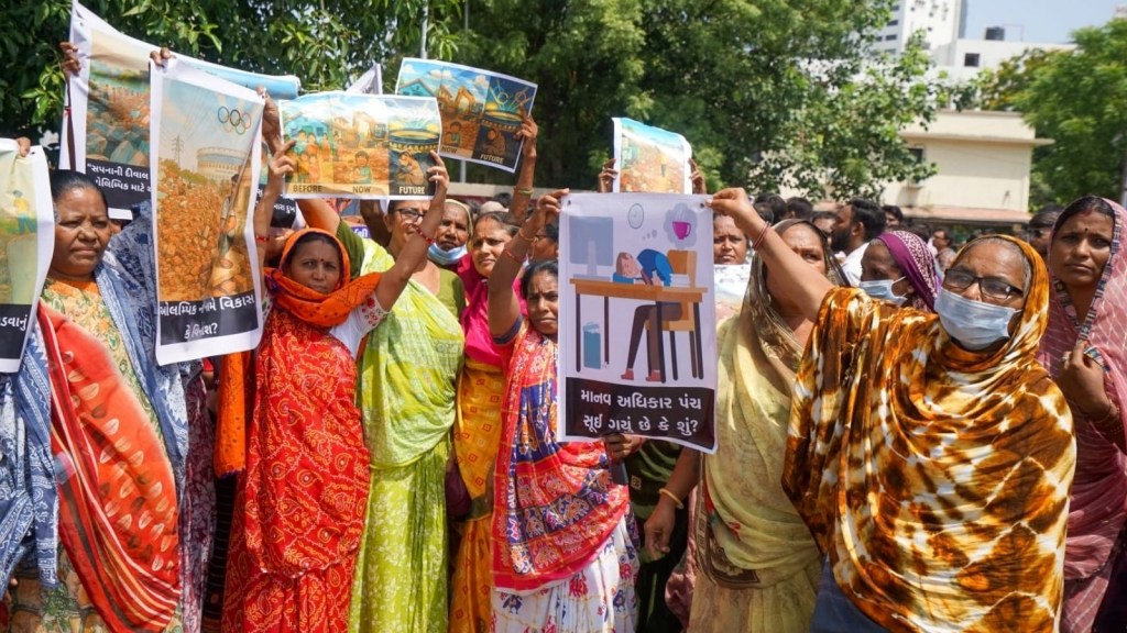 Today News Update in Gujarati: અમદાવાદમાં 2036 ઓલિમ્પિક, મકાનો તોડી પાડવાની નોટિસ બાદ વિરોધ, મૌન રેલી Today News Update in Gujarati: અમદાવાદમાં 2036 ઓલિમ્પિક, મકાનો તોડી પાડવાની નોટિસ બાદ વિરોધ, મૌન રેલી