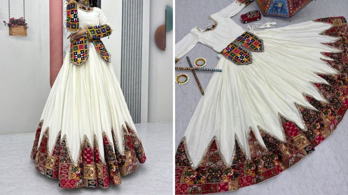 <strong>Navratri 2025 Fashion Trends</strong><br>જો તમને નવરાત્રીમાં સફેદ ટ્રેડિશનલ ડ્રેસ પહેરવો છે તો આ આઉટફિટ જરૂર ટ્રાય કરવા જોઇએ. સફેદ ચણિયાની કિનારીમાં કચ્છી વર્કની બોર્ડર ટ્રેડિશનલ લુક આપે છે. ઉપરના ટોપમાં નેક, સ્લીવ અને કમરના ભાગે કચ્છી વર્કના પેચ યુનિક લુક આપે છે. (Photo: radha.fashion.__)